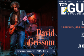 David Grissom gra na gitarze na scenie z wzmacniaczami PRS, magazyn Top Guitar.